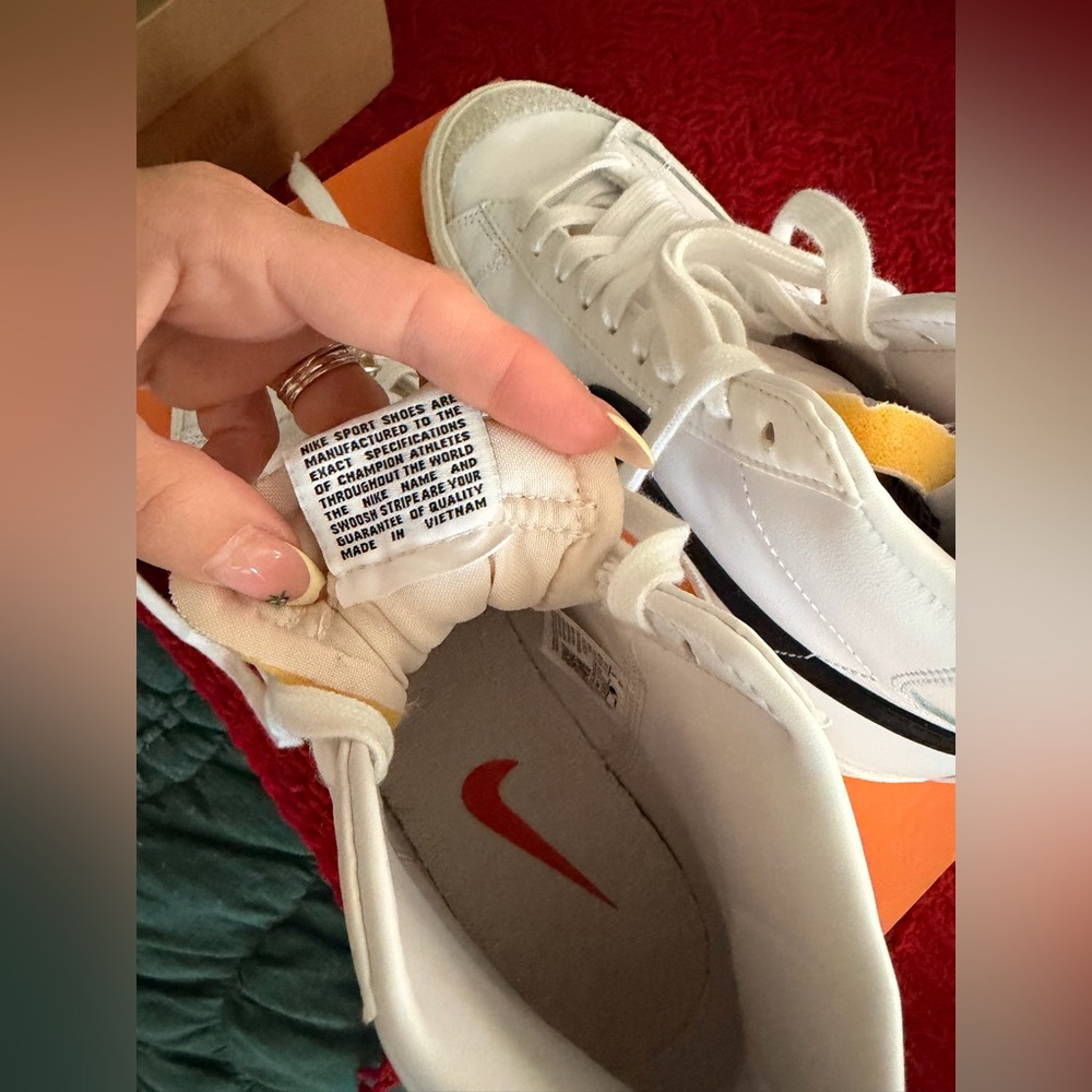 Nike White High-Top Sneakers with Black Swoosh - Picture 2 of 6
